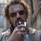 jos   garcia allumant sa cigarette - Le Mac 