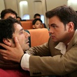 Clovis Cornillac et Pascal Elbé dans l'avion