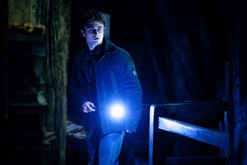 harry potter baguette a la main