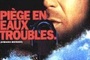 Affiche du film Piège en eaux troubles