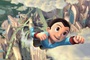 astro boy grimpant dans le ciel