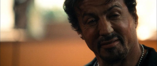 sylvester stallone tout sourire